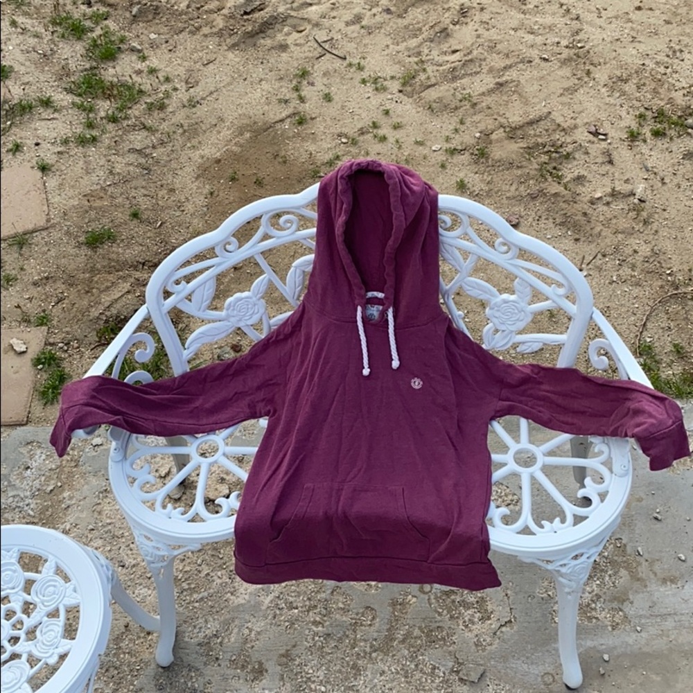 Maroon sweatshirt.